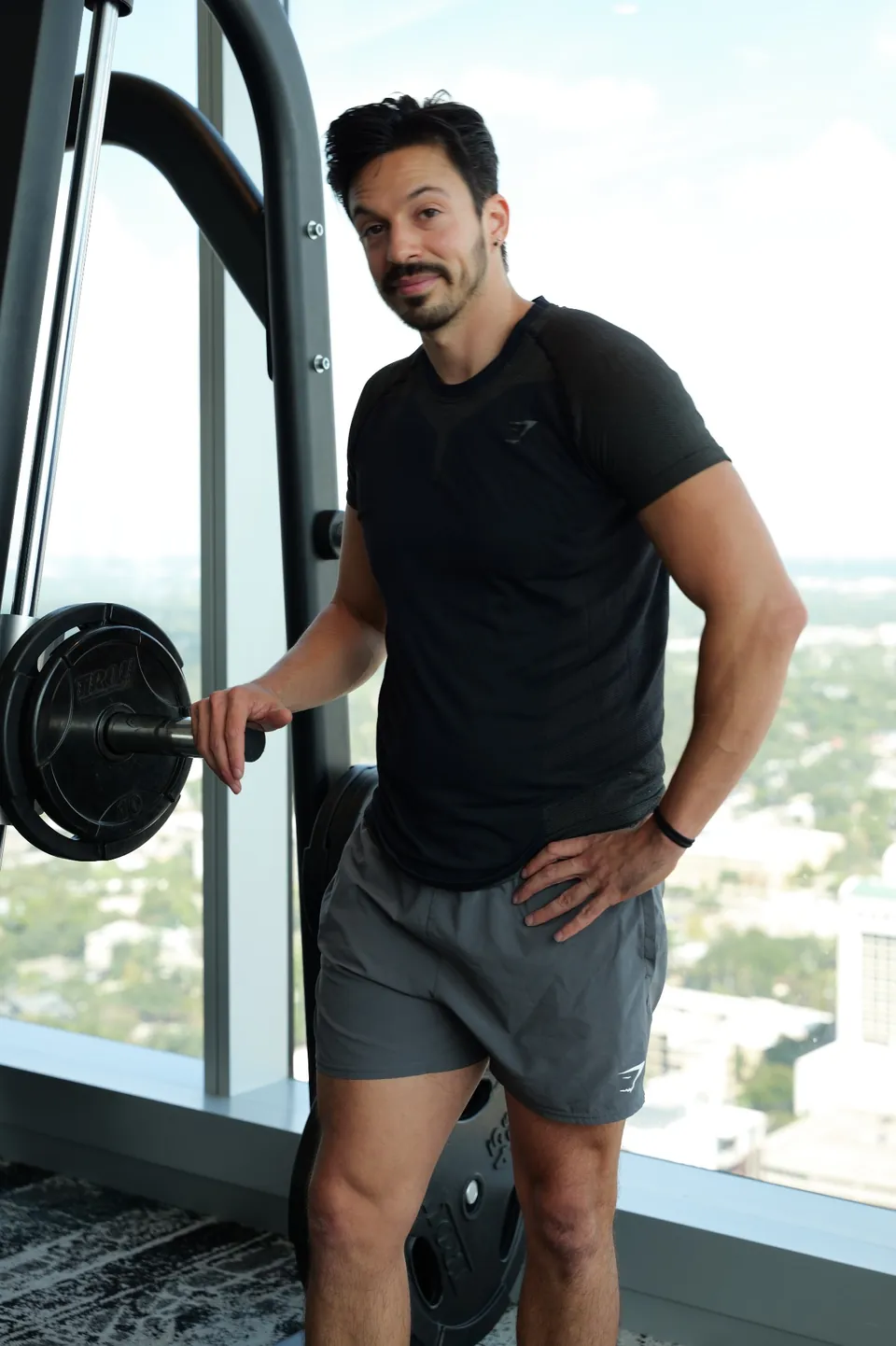 Joe Bejarano, founder of Guerilla Training, in a private high-rise fitness center.